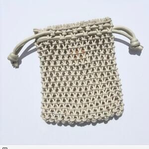 Clare V. Sandy Drawstring Clutch crocheted ivory cotton leather handles bag